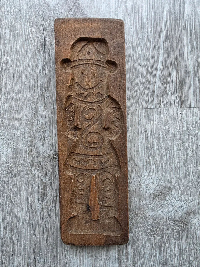 Houten speculaasplank met mannenfiguur