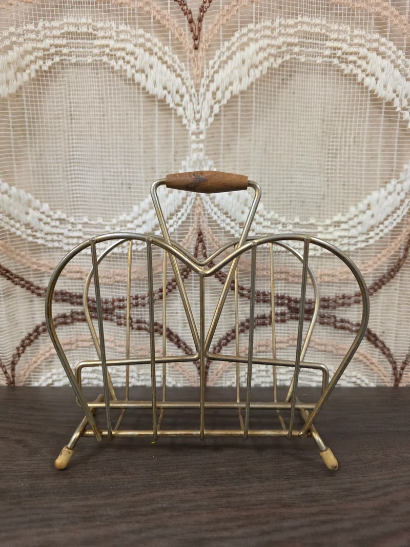 Vintage metalen servethouder met houten handgreep