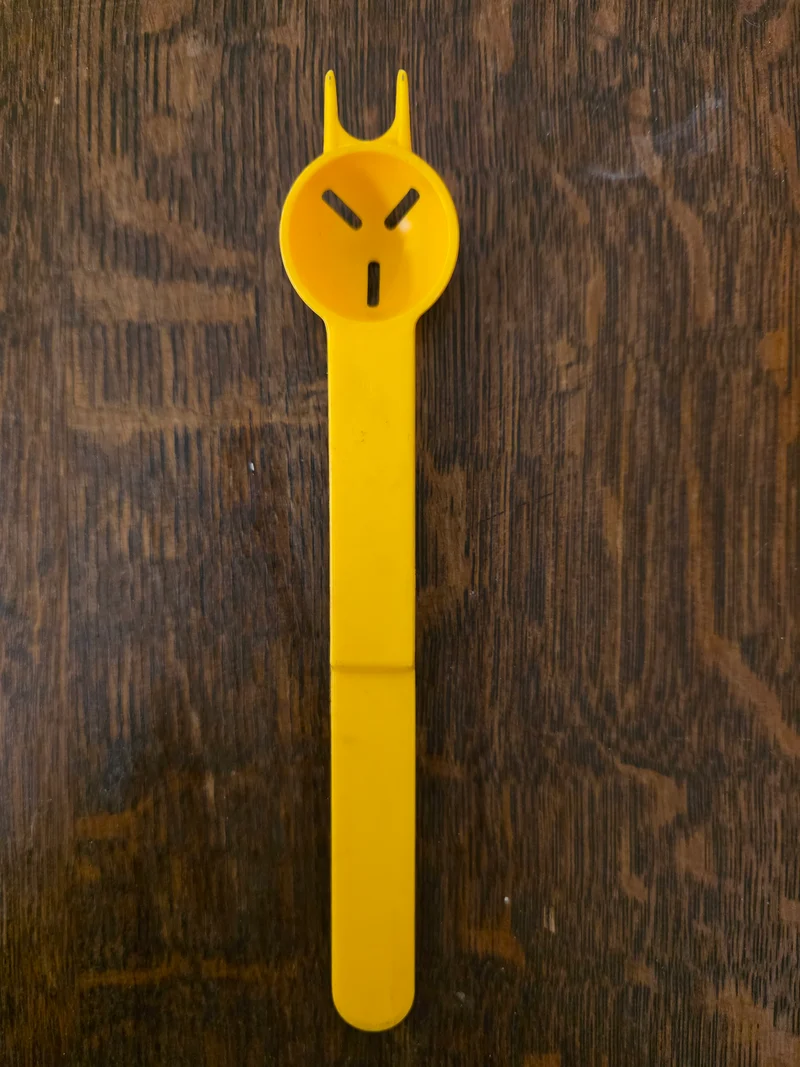 Tupperware zuurkatje geel