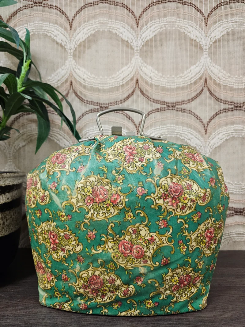Vintage theebeurs met knip groen bloemenpatroon